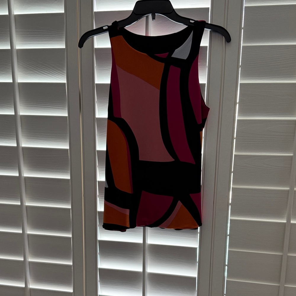 Sleeveless Abstract Print Tank Top in Magenta and Orange. Reverses to black.